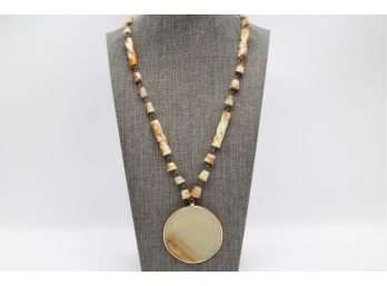 Carved Stone Necklace With Etched Pendant