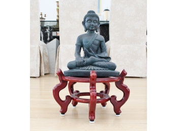 Sitting Buddha On A Cherry Wood Display Stand