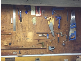 Tools And Hardware On All Four Walls