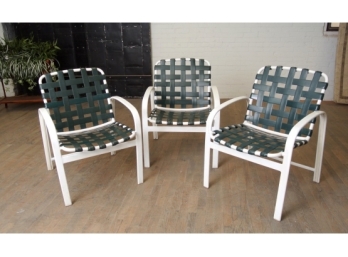 Three Vintage Stacking Aluminum Chairs