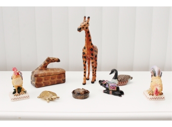 A Collection Of Animal Figurines And Trinket Boxes