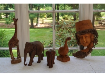 Group Of Carved Figures And Animal