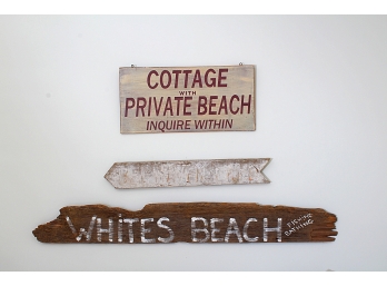 Three Beach Signs