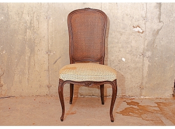 Carved Cane Back And Upholstered Side Chair In A Dark Finsih