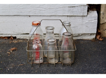 Old Fashion Milk Bottles In Wire Carrying Basket