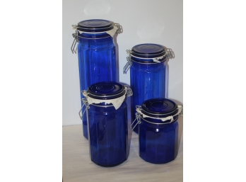 Four Cobalt Blue Glass Canisters