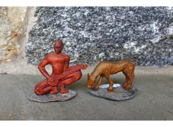 Two Carved Wooden Figures Designed By Joe Ralph