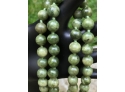 Single Strand Of Jade Beads With Sterling Clasp, Hangs 30'