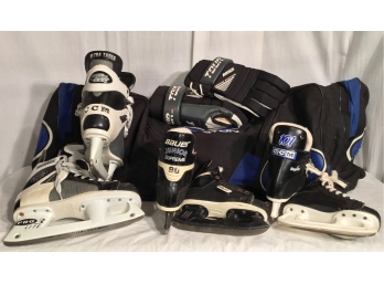 Three Pairs Of Hockey Skates And Accessories
