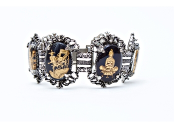 Silver Tone Bracelet Set With Six Oriental Themed Medallions