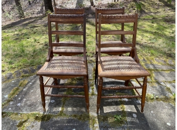 Set Of Four Carved Antique Caned Chairs