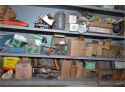 Assortment Of Car Parts And Books