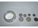 (#219) Foreign Coins And Magnifier