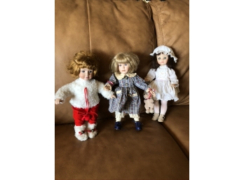 (#162) Collectable Dolls - 2 Porcelain / 1 Plastic  Stamped Check Photo's