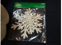 Unpainted Paper Mache Pumpkins And Snowflake Ornaments.