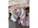 Lot Of Vintage And Antique Doll Clothes And Doll, Small Hangers, And Bottles.