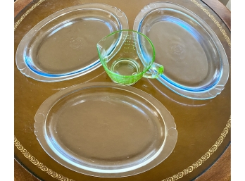 Collection Of Three Pyrex Glass Dishes And A Green Glass Measuring Cup