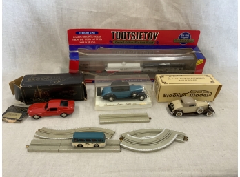Toy Lot Including Die Cast Cars And A Grey Hound Slot Car
