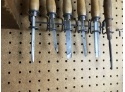 Assortment Of Chisels In Rack