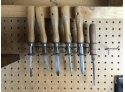 Assortment Of Chisels In Rack
