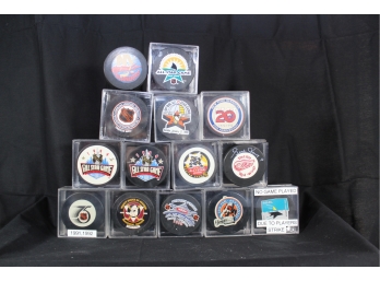 Lot Of 14 Various Official Hockey Pucks - Item #062