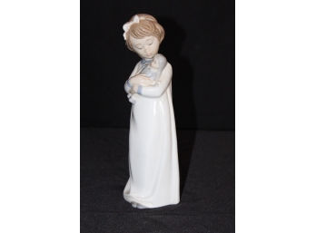 NAO By Lladro Young Girl Holding Doll - Excellent Condition - Item #69