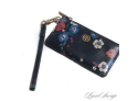 OMG CUTE. AUTHENTIC TORY BURCH MARINE BLUE SAFFIANO LEATHER FLORAL WRISTLET