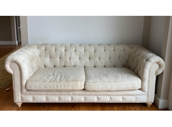 CONTEMPORARY UPHOLSTERED TUFTED SOFA ON BUN FEET