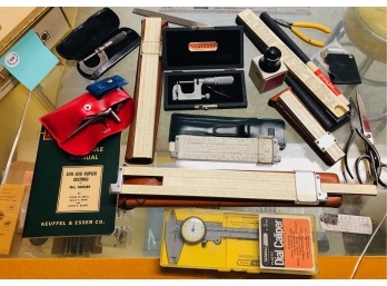 LOT SLIDE RULES, MICROMETERS AND A MANUAL