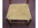 204. Antique Ladder-Back Rocking Chair