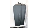 Large Tumi Roller Suitcase