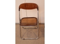 Set Of 3 Amber Acrylic Folding Chair With Chrome Trim  1 Partial Chair