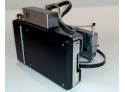 Polaroid Model 250 Folding Instant Camera With Pull Out Bellows And Leather Strap.