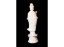 White Porcelain Figure On Wooden Base