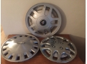 Hubcap Assortment-2 Metal, The One Standing Up Is Plastic