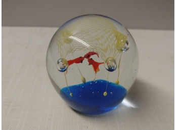 Art Glass Paperweight Depicting Fish Underneath Net