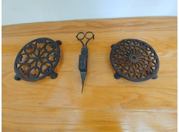 2 Antique Cast-iron Footed Trivets And Scissor Form Candle Snuffer