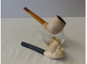 Two Meerschaum Pipes One With Figural Head The Other Tree Bark Pattern