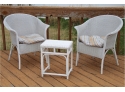 A Matching Pair Of Wicker Side Chairs With Matching Table