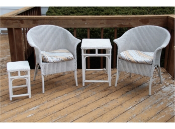 A Matching Pair Of Wicker Side Chairs With Two Matching Tables