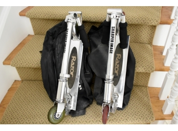 Pair Of Kids Razor Scooters With Carry Cases