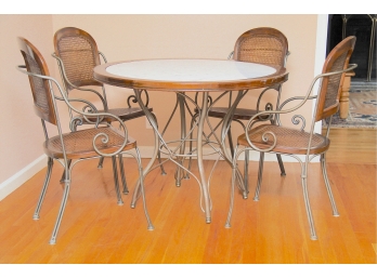A MCM Drexel Marble Top Table With Four Wrought Iron And Cane Chairs