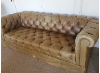 A Distressed Chesterfield  Tufted Sofa