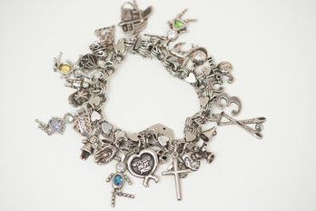 Incredible Vintage Sterling Charm Bracelet With 28 Sterling And One 14k Mercedes Gold Charm