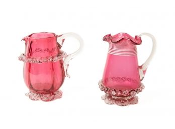 2 Art Glass Cranberry Footed Jugs / Creamers