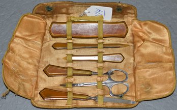VINTAGE MANICURE SET W/ BAKELITE HANDLES IN FITTED LEATHER CASE