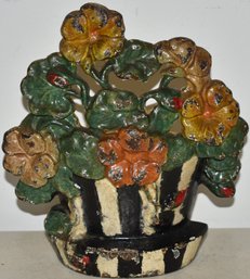 PAINTED CAST IRON FLORAL DOORSTOP