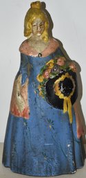 PAINTED CAST IRON LADY W/ HAT & FLOWERS DOORSTOP