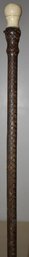36 1/2' SNAKE SKIN COVERED CANE W/ CARVED HANDLE
