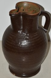 BROWNWARE POTTERY PITCHER W/ TOOLED DECORATION